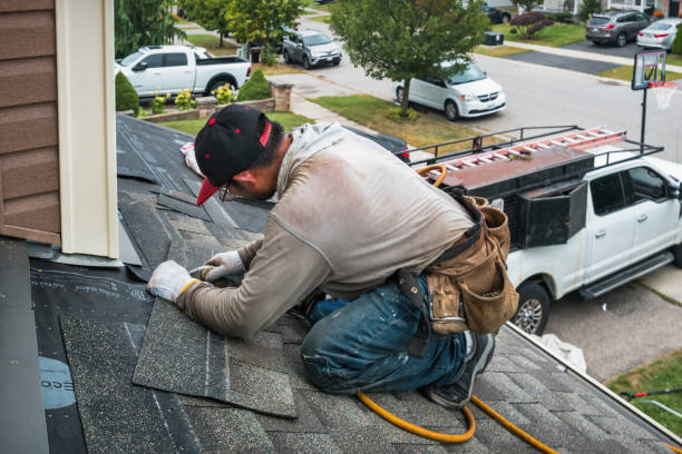Professional Roof Replacement technician working in Charlottesville, IN